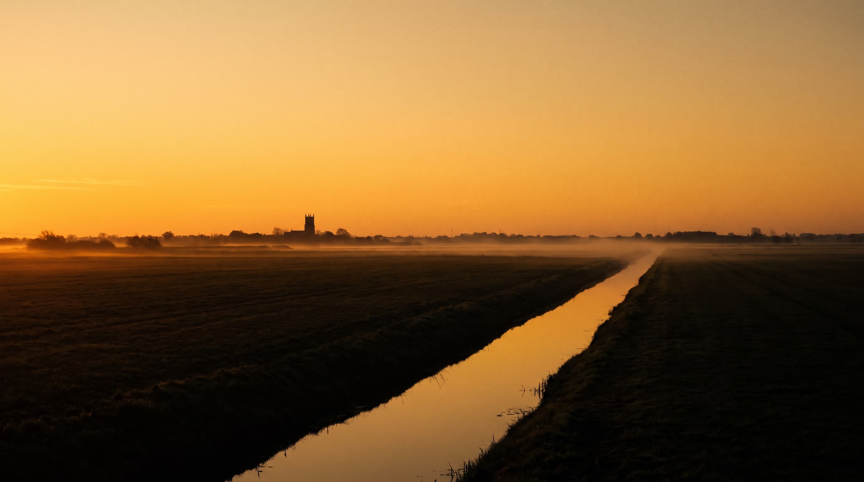 Lincolnshire fenland at amber dusk